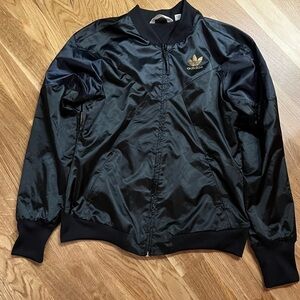 Adidas Women’s Black Satin Track Jacket with Gold Adidas logo, size 38 (S)